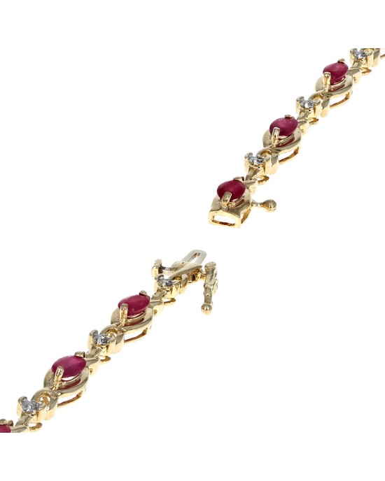 Alternating Ruby and Diamond Crossover Link Bracelet in Yellow Gold